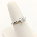 ANILLO TIPO COMPROMISO CON CUERPO ENREDADO DE ORO BLANCO DE 14K