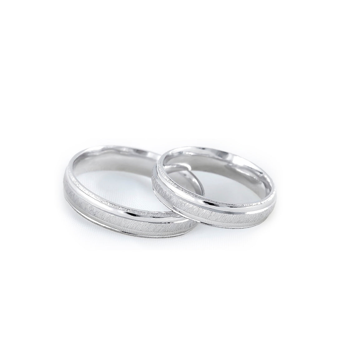 ARGOLLA HUECA DE MATRIMONIO DE ORO BLANCO DE 10K CON DISEÑO