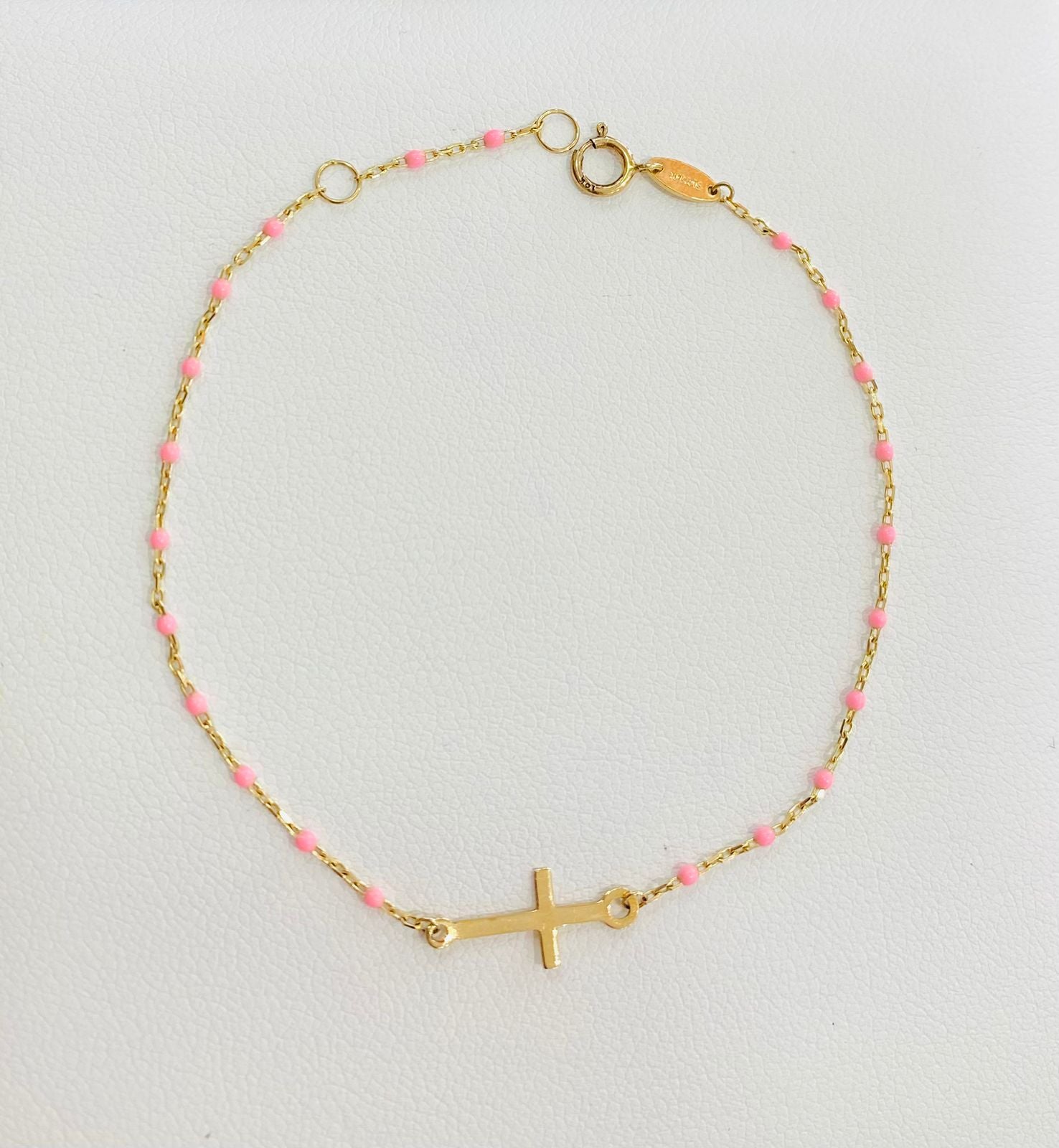 Pulsera oro 10k con cruz y cuentas rosas