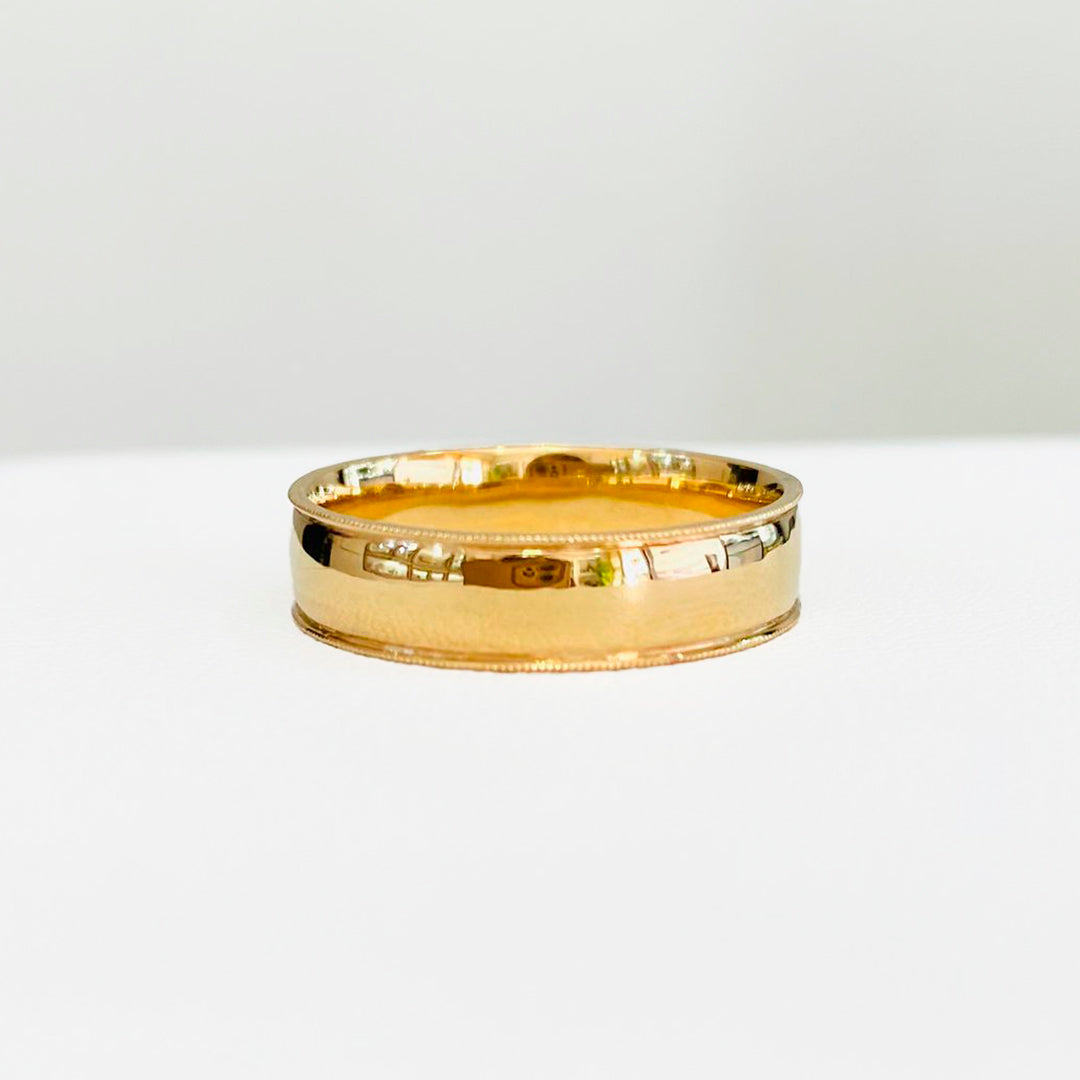 ARGOLLA SOLIDA DE MATRIMONIO ORO AMARILLO DE 10K CON DETALLES A LAS ORILLAS 5MM